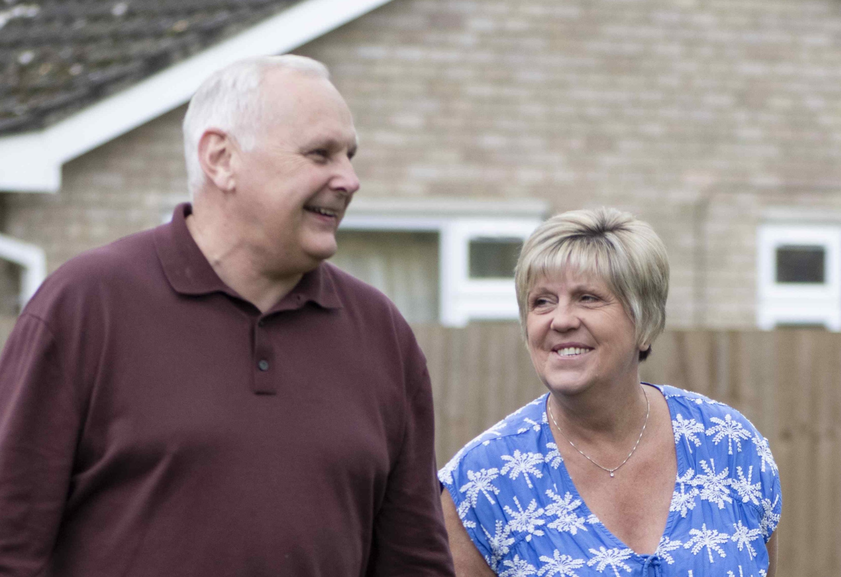 Lynda and husband smiling together
