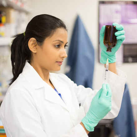 Female researcher in lab.jpeg