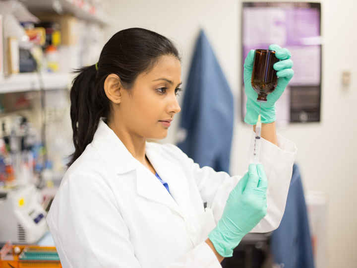 Female researcher in lab.jpeg