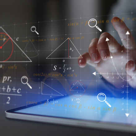 Screen with mathematical equations and symbols coming out of it and hands typing