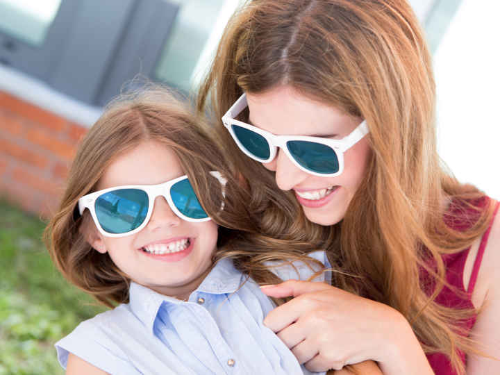 Mother and daughter in sunglasses