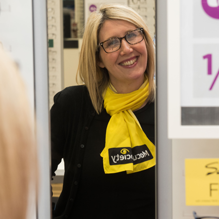 Vision Express, woman with Macular Society scarf