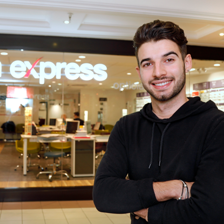 Zac Shaw outside Vision Express shop