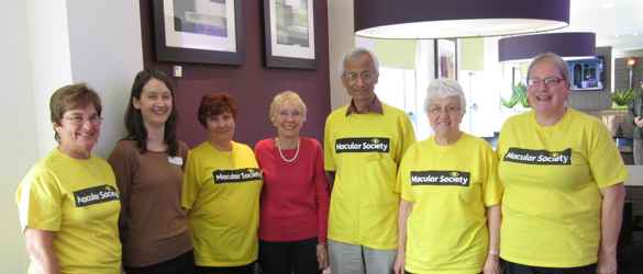 Group picture of some volunteers in yellow t-shirts