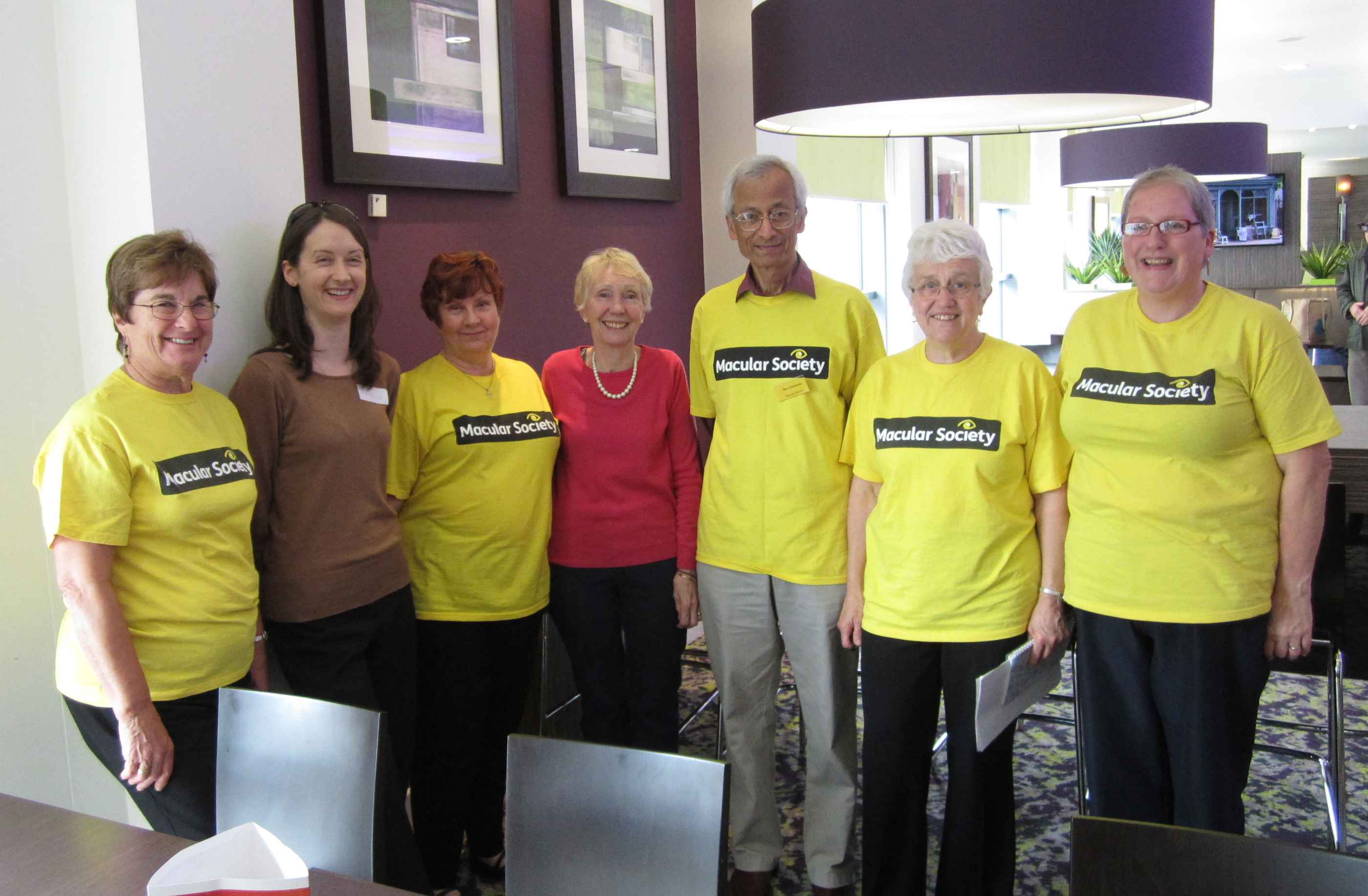 Group picture of some volunteers in yellow t-shirts