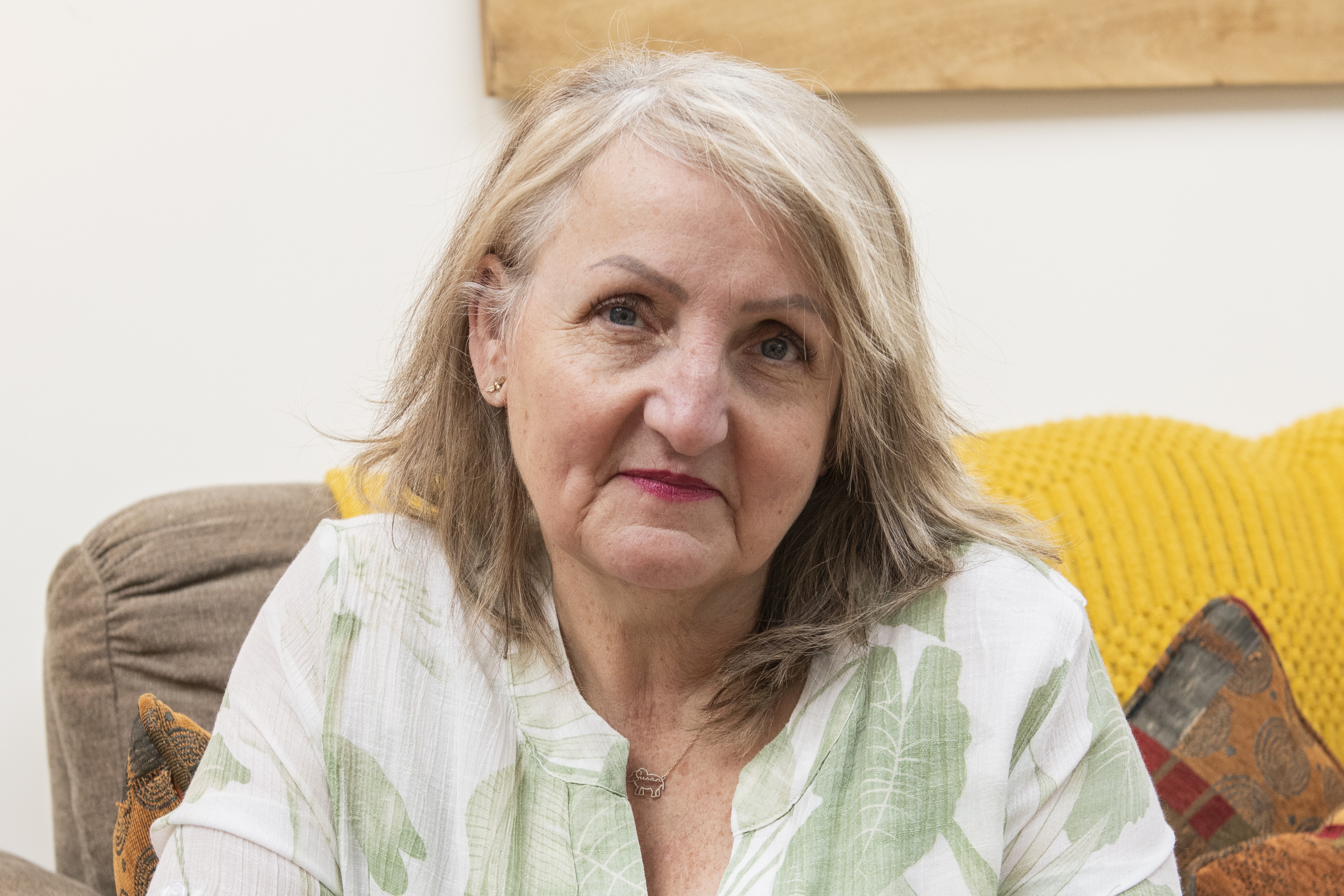 Sue looking directly to camera
