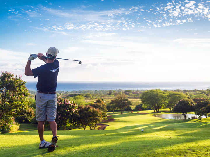 Man playing golf