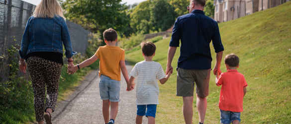 Kelly and family walking outside