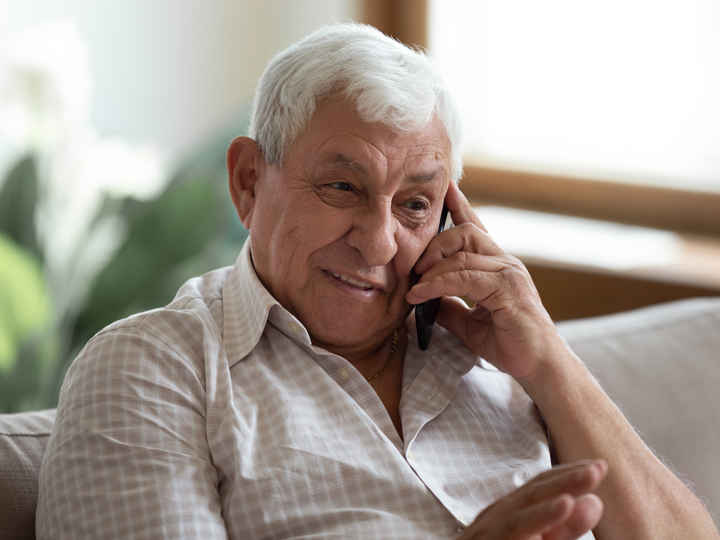Elderly man on phone