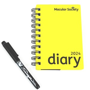 Yellow Diary With Pen