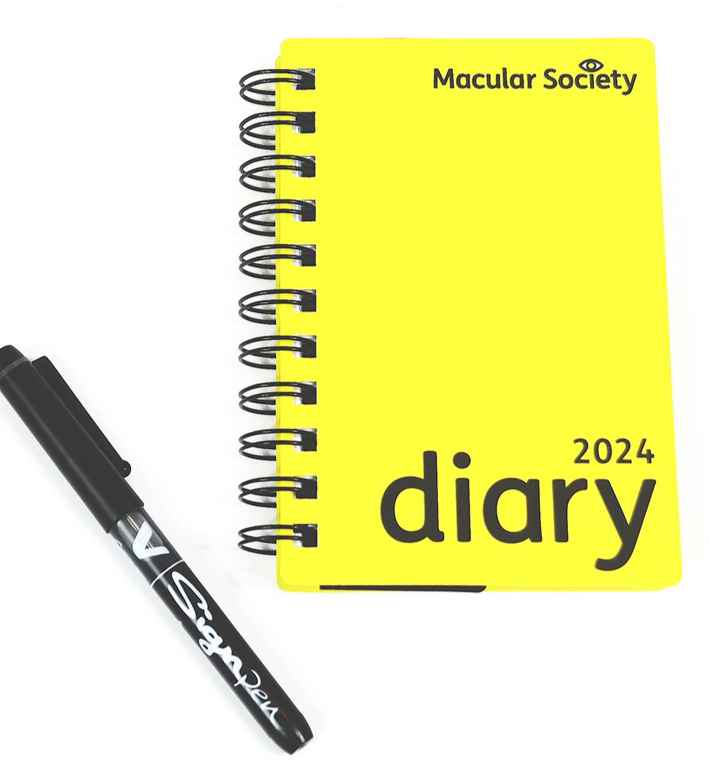 Yellow Diary With Pen