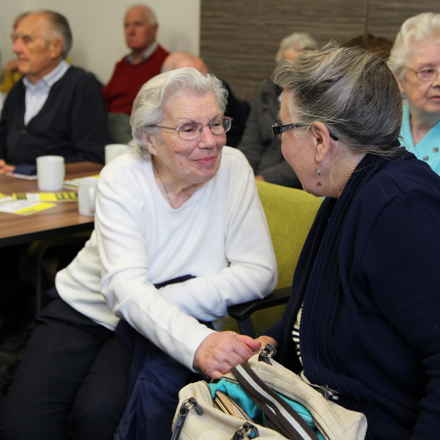 Harlow group smiling and talking