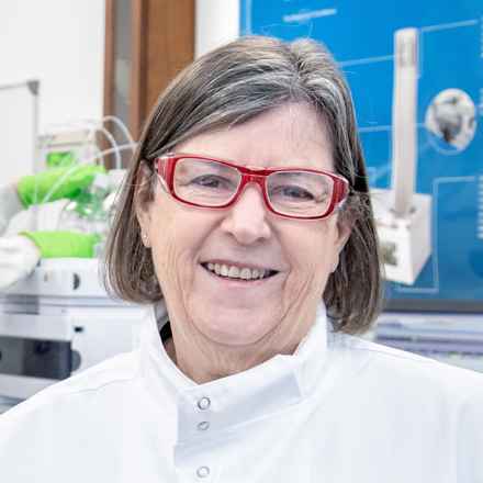 Professor Dulcie Mulholland in her lab smiling