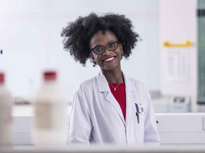 Researcher smiling