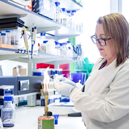 Researcher Amanda Carr with Bunson Burner