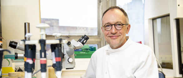 Andrew Dick looking into camera