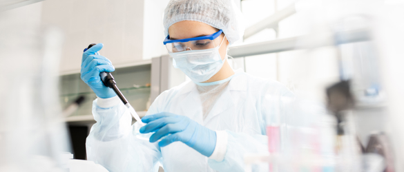 micro biologist with petri dish