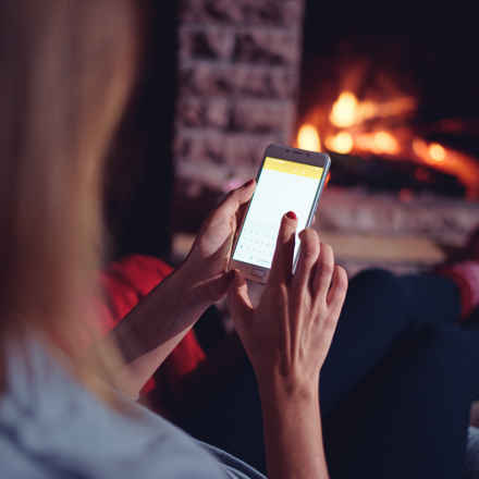 winter-warm-cozy-fire-smart-phone.jpeg