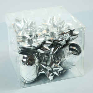 Packaged box of silver bows and ribbon