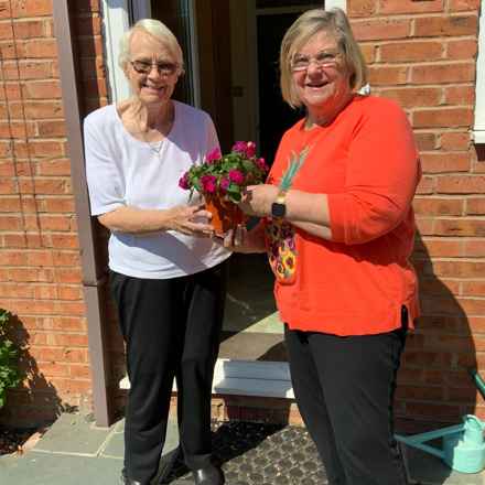 Jane Figg Group Leader With Flowers