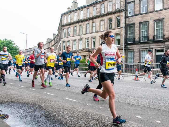 Runners in Edinburgh with one in the lead