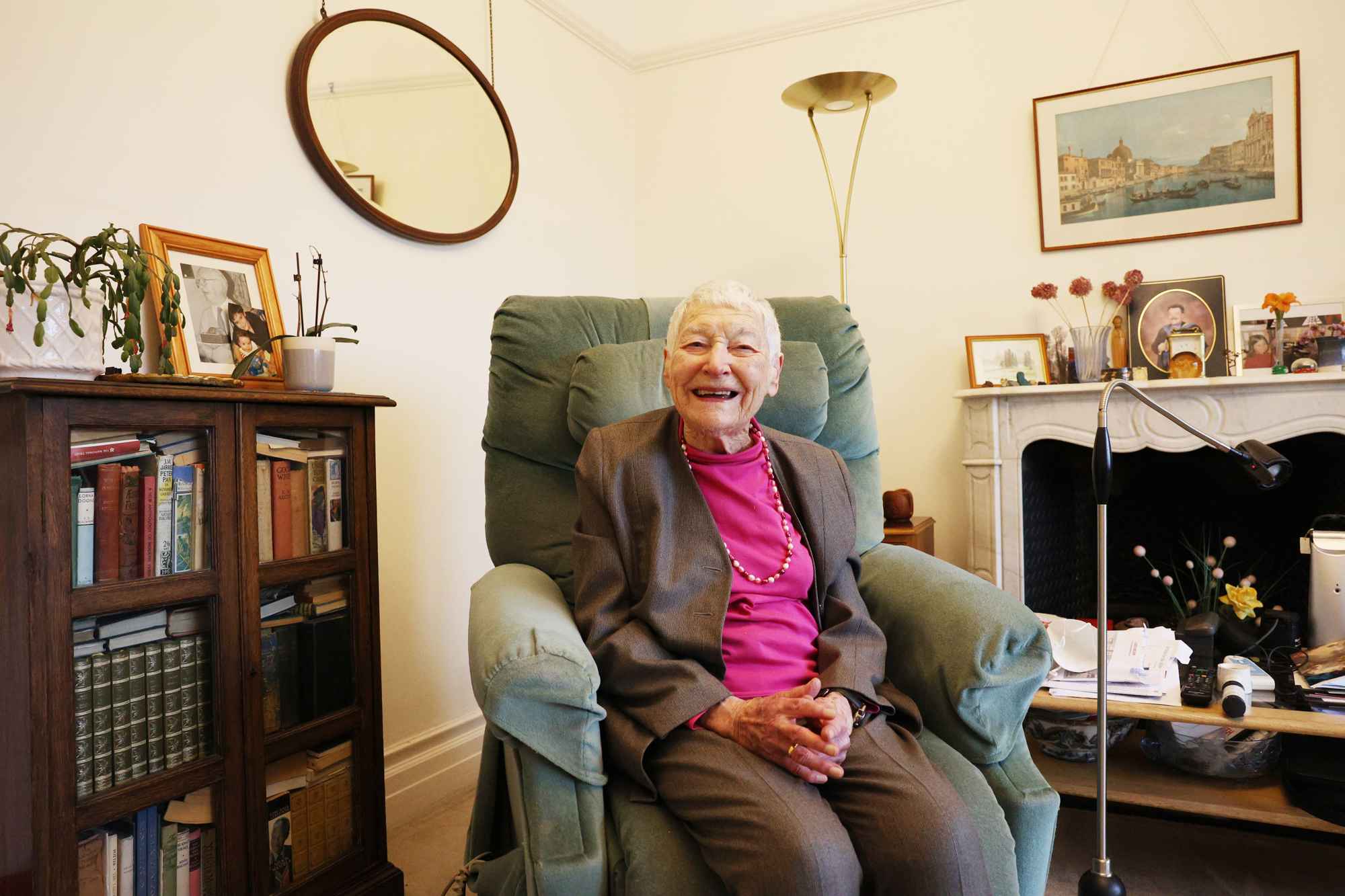Barbara Hogg smiling in armchair