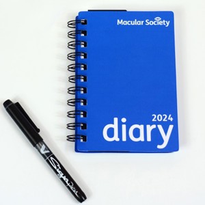 Blue Diary With Pen