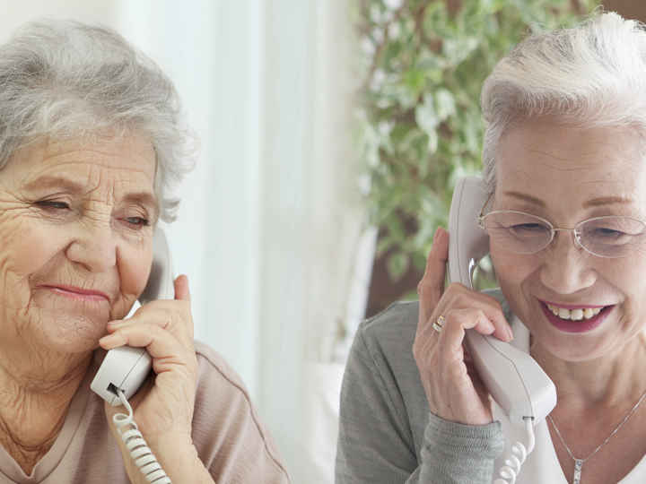 Befrienders talking to each other on phone