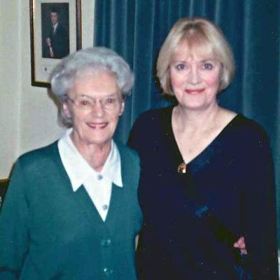 Sheila and mother, Minnie smiling and hugging