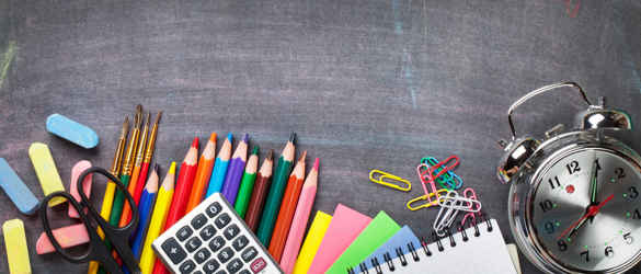 Teaching supplies including pencils, calculator and paper clips