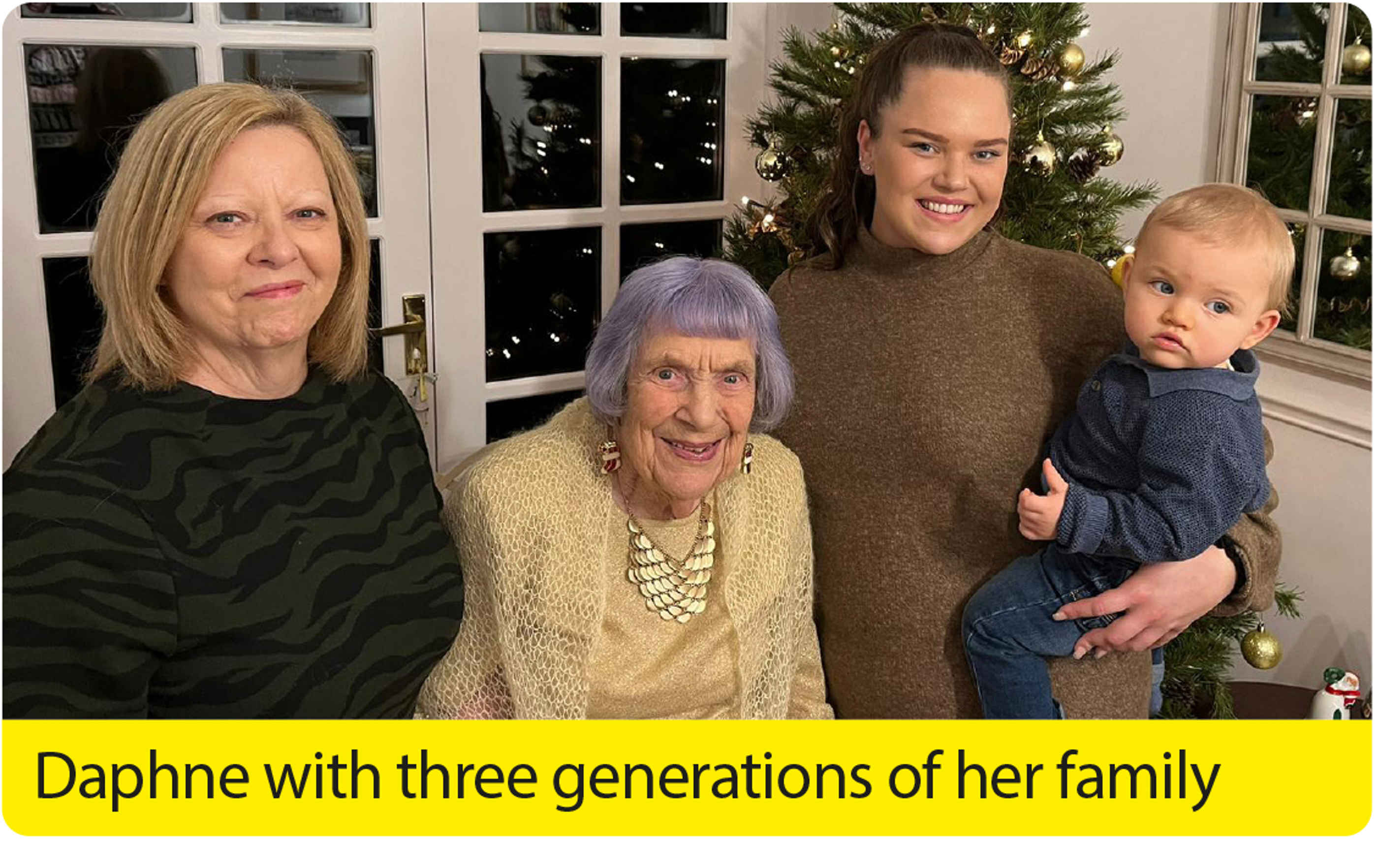 Daphne with three generations of her family