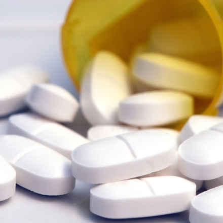 Medication spilling out of container